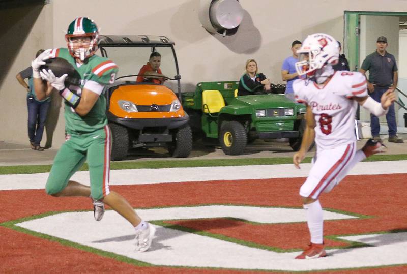 L-P's Michael Hartman makes a catch for a touchdown leaps in the air to celebrate scoring the teams second touchdown over Ottawa's Bryson Valdez on Friday, Sept. 13, 2024 at Howard Fellows Stadium.