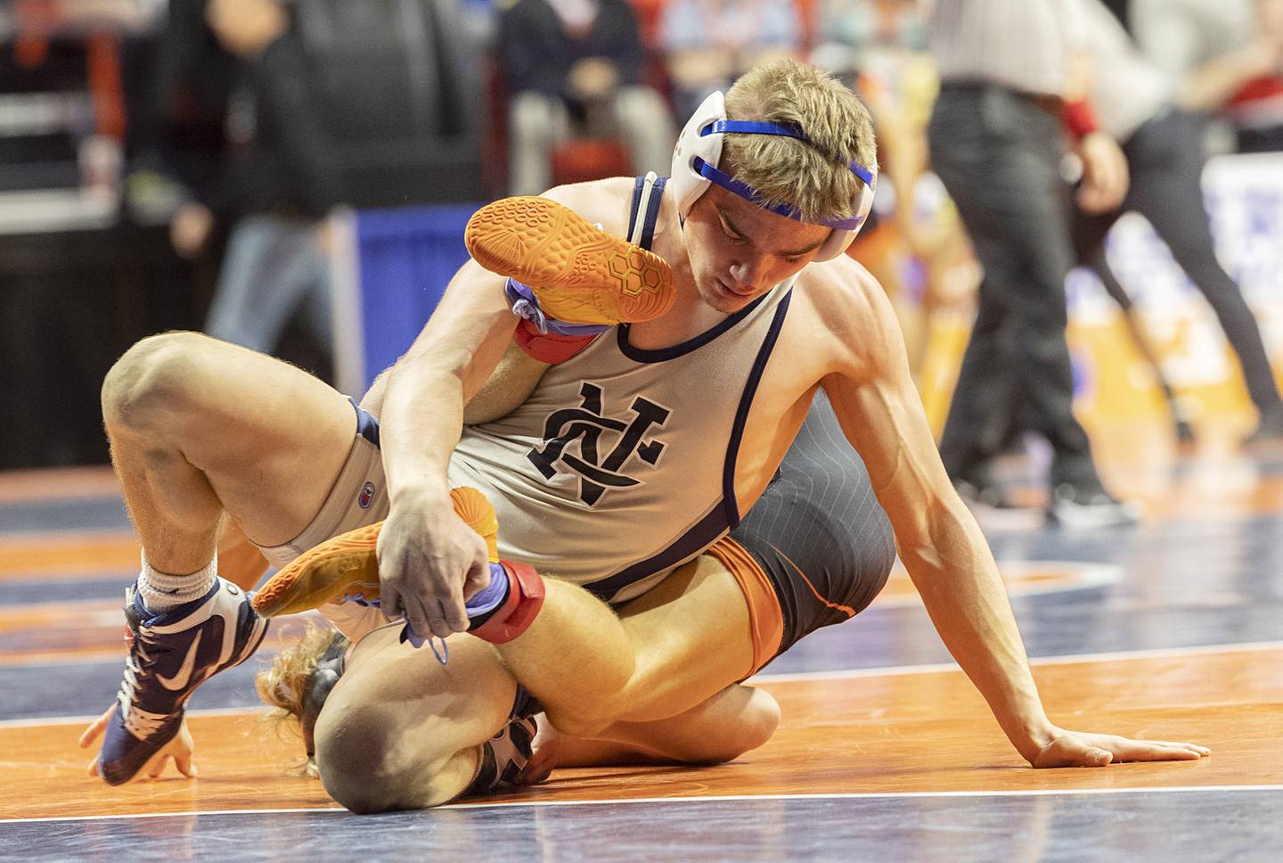 Sterling Newman Central’s Brady Grennan controls Richland’s Carson Bissey in the 132 pound 1A third place match Saturday, Feb. 17, 2024 at the IHSA state wrestling finals at the State Farm Center in Champaign.