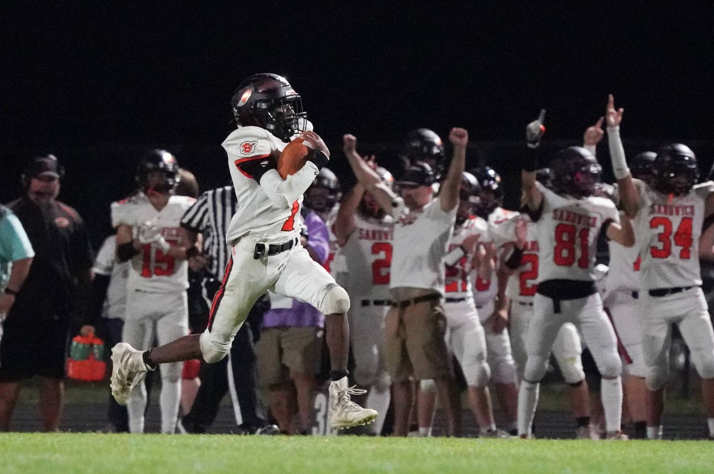 Sandwich's Simeion Harris (1) carries the ball for a touchdown against Plano during a football game at Plano High School on Friday, Sep 13, 2024.