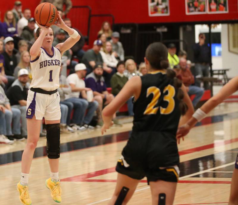 Serena's Gwen O'Connell shoots a jump shot over Ashton-Franklin Center's Brianna Gonnerman during the Class 1A Regional final on Thursday, Feb. 15, 2024 at Earlville High School.