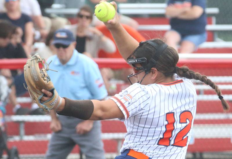 Oswego's Karina Benes fires a pitch to Mundelein during the Class 4A third place game on Saturday, June 8, 2024 at the Louisville Slugger Sports Complex in Peoria.