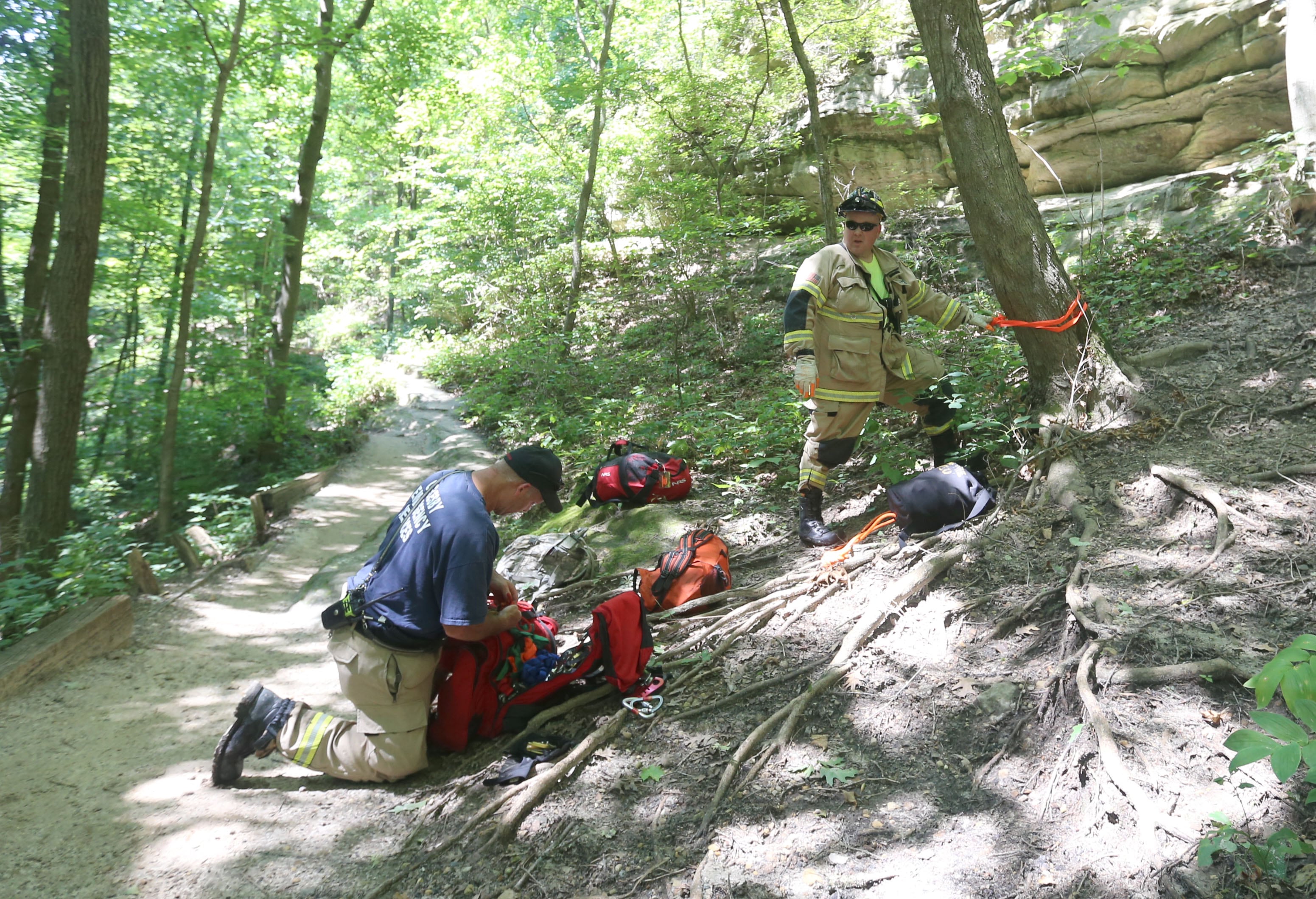 Oglesby firefighters Steve Maltas and Derek Vicich prepare for a rope rescue for a male subject who fell at La Salle Canyon on Wednesday, July 17, 2024 at Starved Rock State Park.