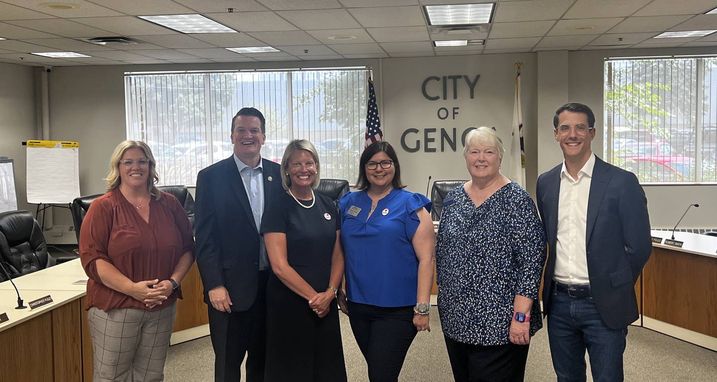 DeKalb County Clerk and Recorder Tasha Sims, a Republican; State Senator Andrew Chesney, R-Freeport; State House Minority Leader Tony McCombie, R-Savanna; Genoa Area Chamber of Commerce Krissy Johnson, DeKalb County Board member Kathy Lampkins, a Republican from District 2; and Genoa Mayor Jonathan Brust stand together after a legislative luncheon hosted by the chamber on August 21, 2024.