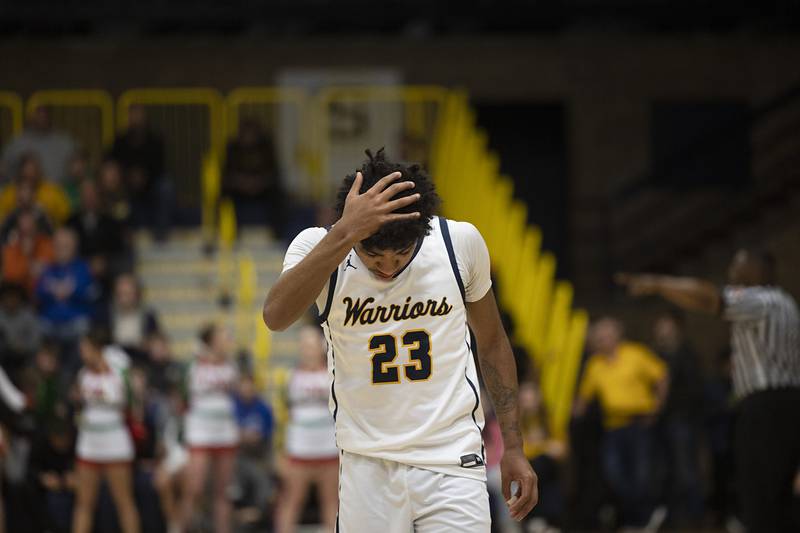 Sterling’s Kaedon Phillips reacts to the waning seconds of the Warriors’ loss to LaSalle-PeruFriday, Feb. 23, 2024 during a class 3A regional final at Sterling High School.