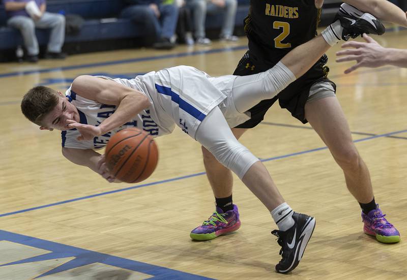 Newman’s Cody McBride makes a pass while falling out of bounds against AFC Monday, Feb. 19, 2024 in a regional quarterfinal game at Newman High School.