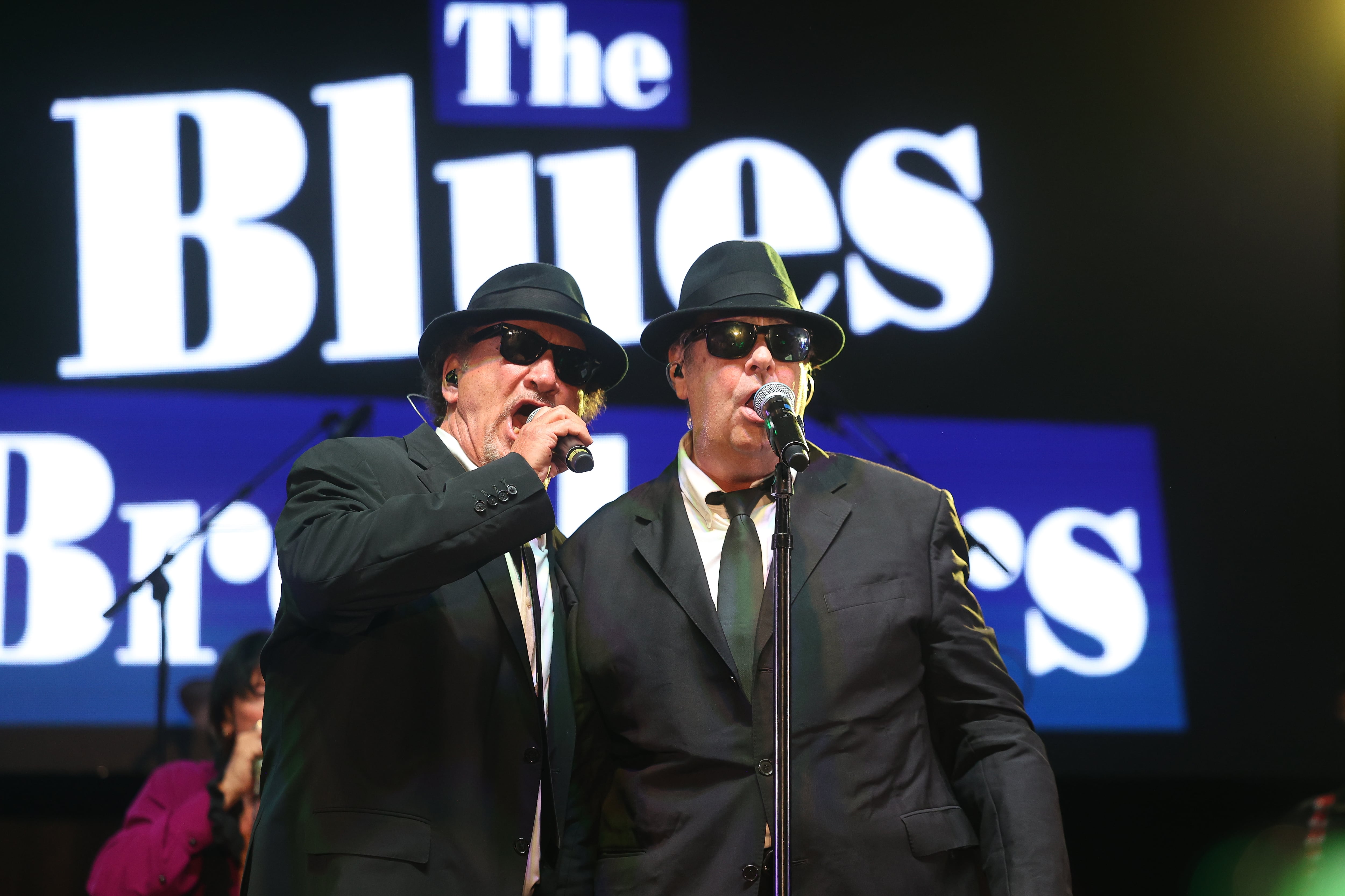 Jim Belushi. aka Zee Blues, and Dan Aykroyd, aka Elwood Blues, performs at Blues Brothers Con: The Sequel on Saturday, August 17, 2024 at the Old Joliet Prison.