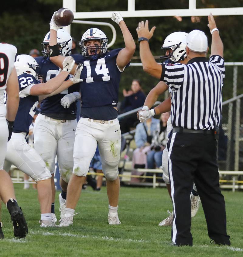 Cary-Grove's Ostin Hansen celebrates his return of a blocked punt for a touchdown during a Fox Valley Conference football game against Crystal Lake Central on Friday, Sept. 6, 2024, at Cary-Grove High School in Cary.