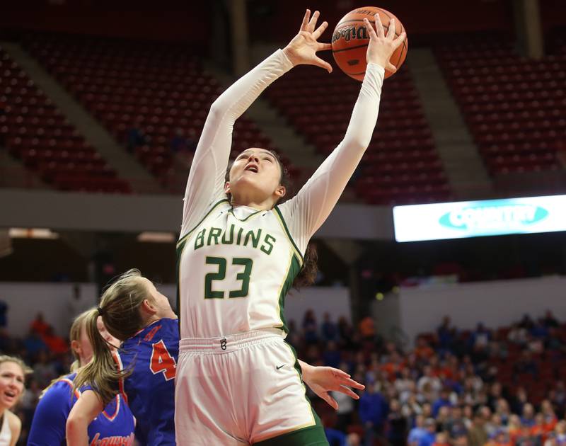 St. Bede's Ali Bosnich looses control of the ball while attempting a layup over Okawville's Caroline Tepe during the Class 1A State semifinal game on Thursday, Feb. 29, 2024 at CEFCU Arena in Normal.