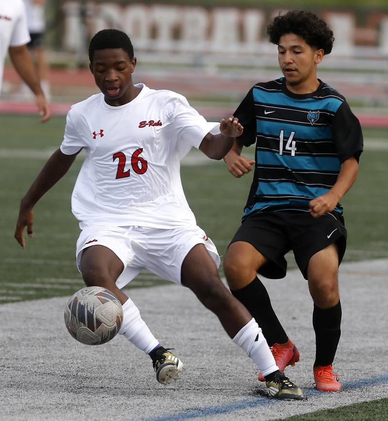 Rockford East's Joseph Kimpinde take the ball from Woodstock North's Brian Flores during a nonconference soccer match on Thursday, Sept. 5, 2024, at Huntley High School.