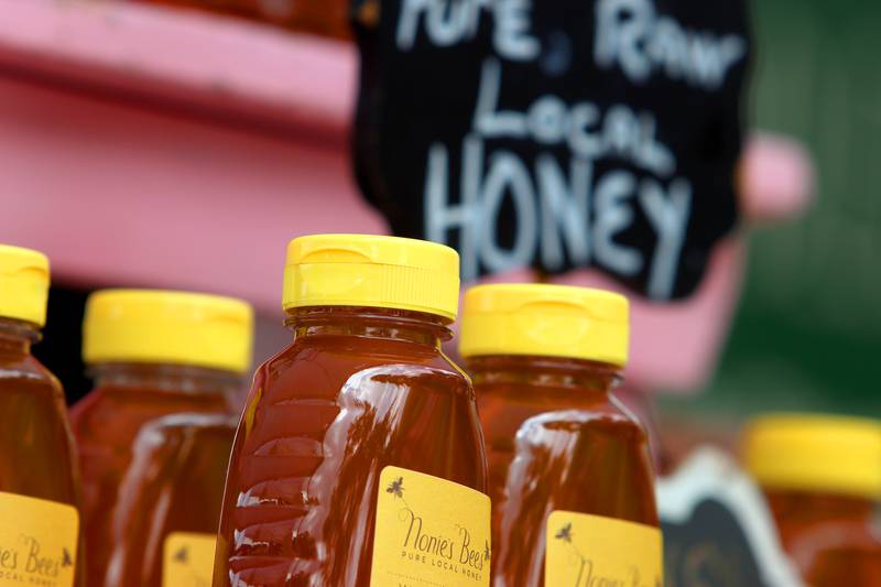 Honey is available at the Nonie’s Bees booth as part of The Dole Farmers Market in Crystal Lake Sunday.