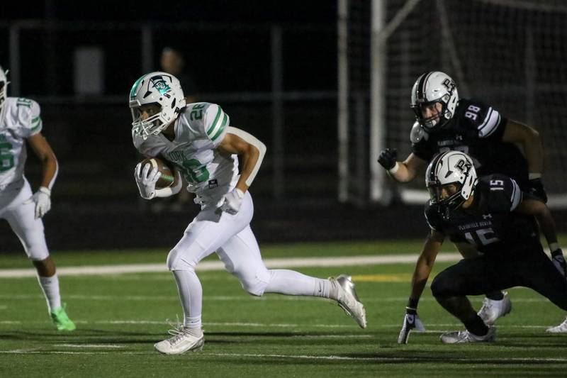 York's Henry Duda (26) takes off up the middle for a long touchdown run during a football game between York at Plainfield North on Friday, Sept 6th, 2024 in Plainfield. Gary E Duncan Sr for Shaw Local News Network.