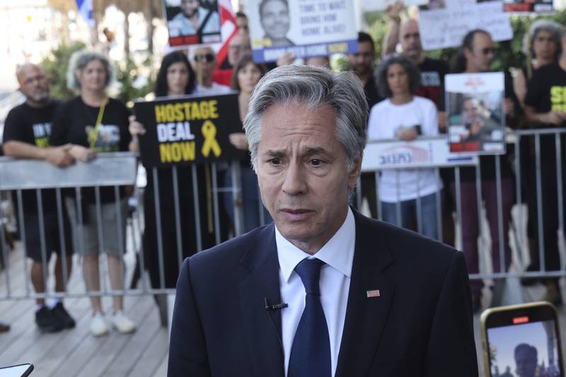 U.S. Secretary of State Antony Blinken speaks to the media as after meeting with families and supporters of Israelis held hostage by Hamas in Gaza, during his visit to Tel Aviv, Israel, Tuesday, June 11, 2024. (Jack Guez, Pool Photo via AP)