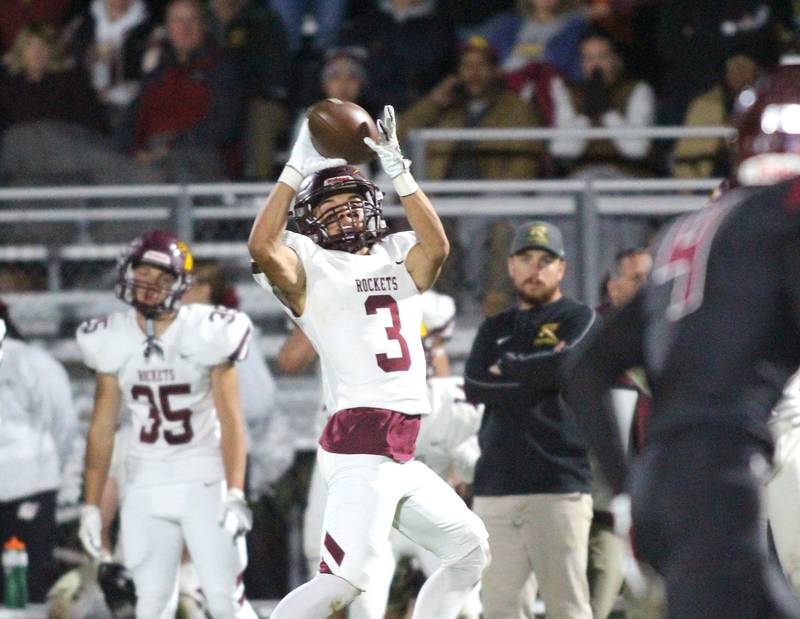 Richmond Burton’s Oscar Bonilla, Jr. hauls in a pass in varsity football at Rod Poppe Field on the campus of Marengo High School in Marengo on Friday, Oct. 18, 2024.