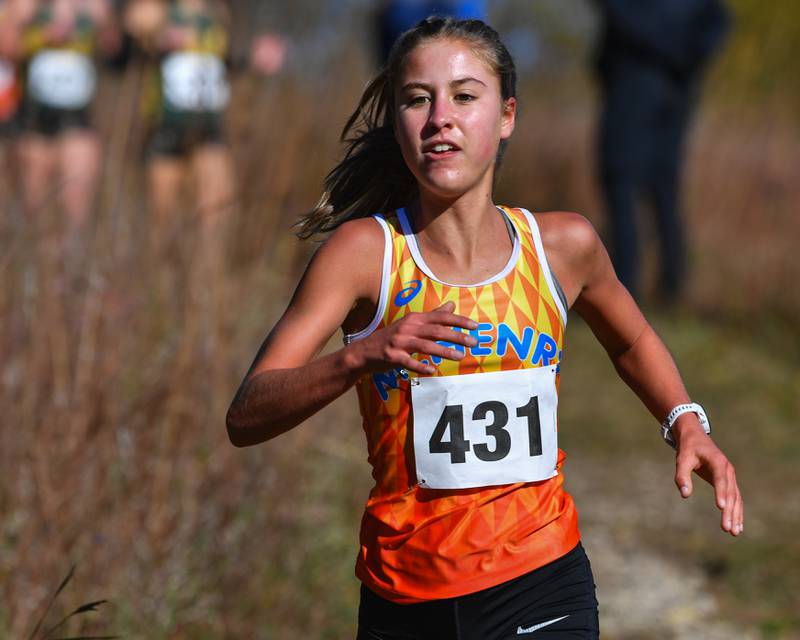 McHenry's Danielle Jensen at the two mile marker during the Fox Valley Conference girls cross country meet at Veteran Acres Park on Saturday, Oct. 15, 2022 in Crystal Lake.