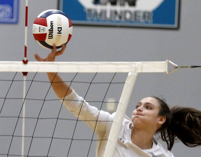 Prairie Ridge's Maizy Agnello puts the ball over the net during the Class 3A Woodstock North Sectional finals volleyball match against  Belvidere North on Wednesday, Nov. 1, 2023, at Woodstock North High School.