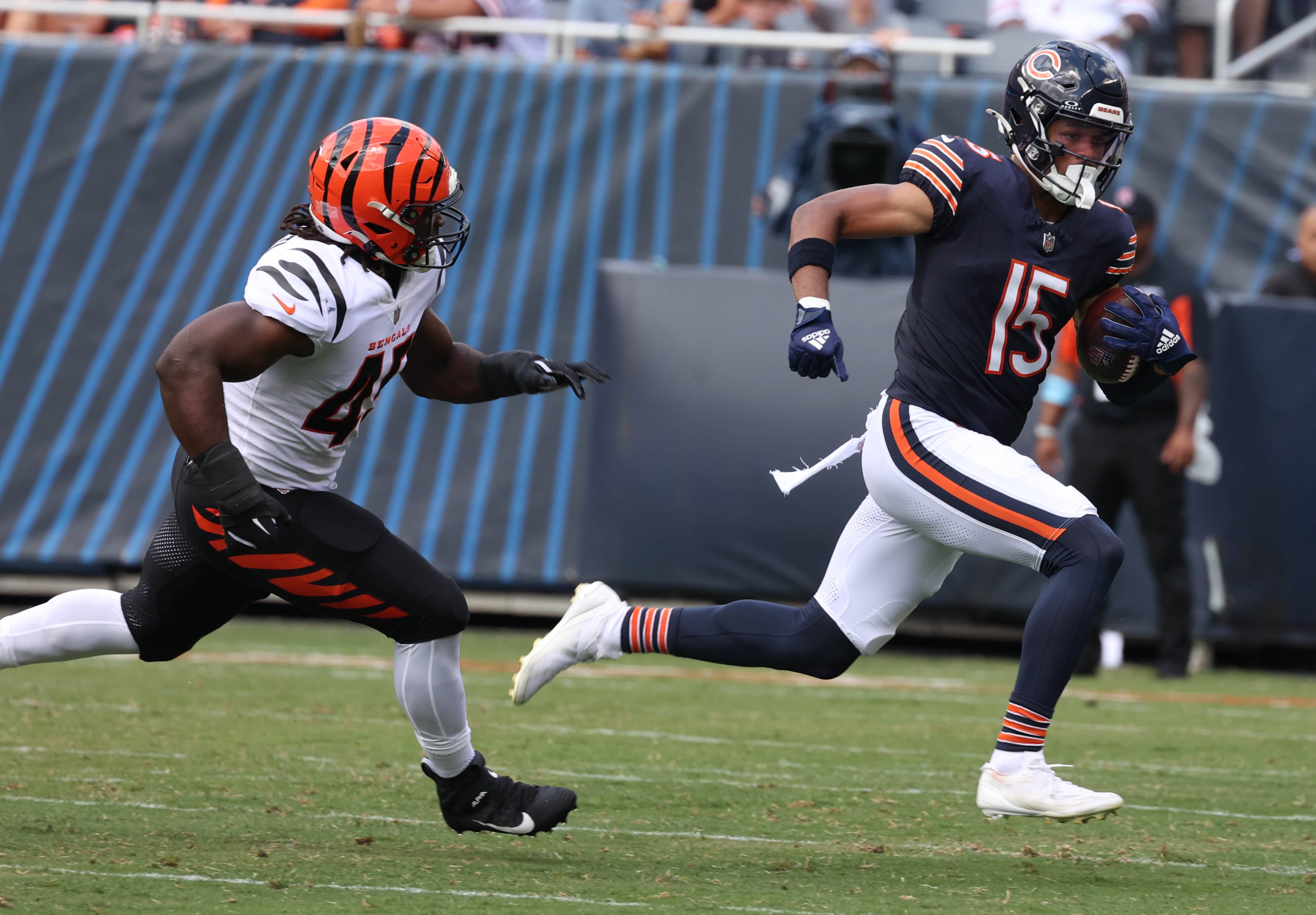 Chicago Bears wide receiver Rome Odunze outruns Cincinnati Bengals linebacker Maema Njongmeta on an end around during their game Saturday, Aug. 17, 2024, at Soldier Field in Chicago.