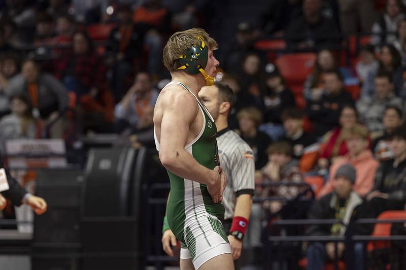 Coal City’s Landin Benson celebrates his win over Tremont’s Bowden Delaney in the 1A 165 pound championship match Saturday, Feb. 17, 2024 at the IHSA state wrestling finals at the State Farm Center in Champaign.