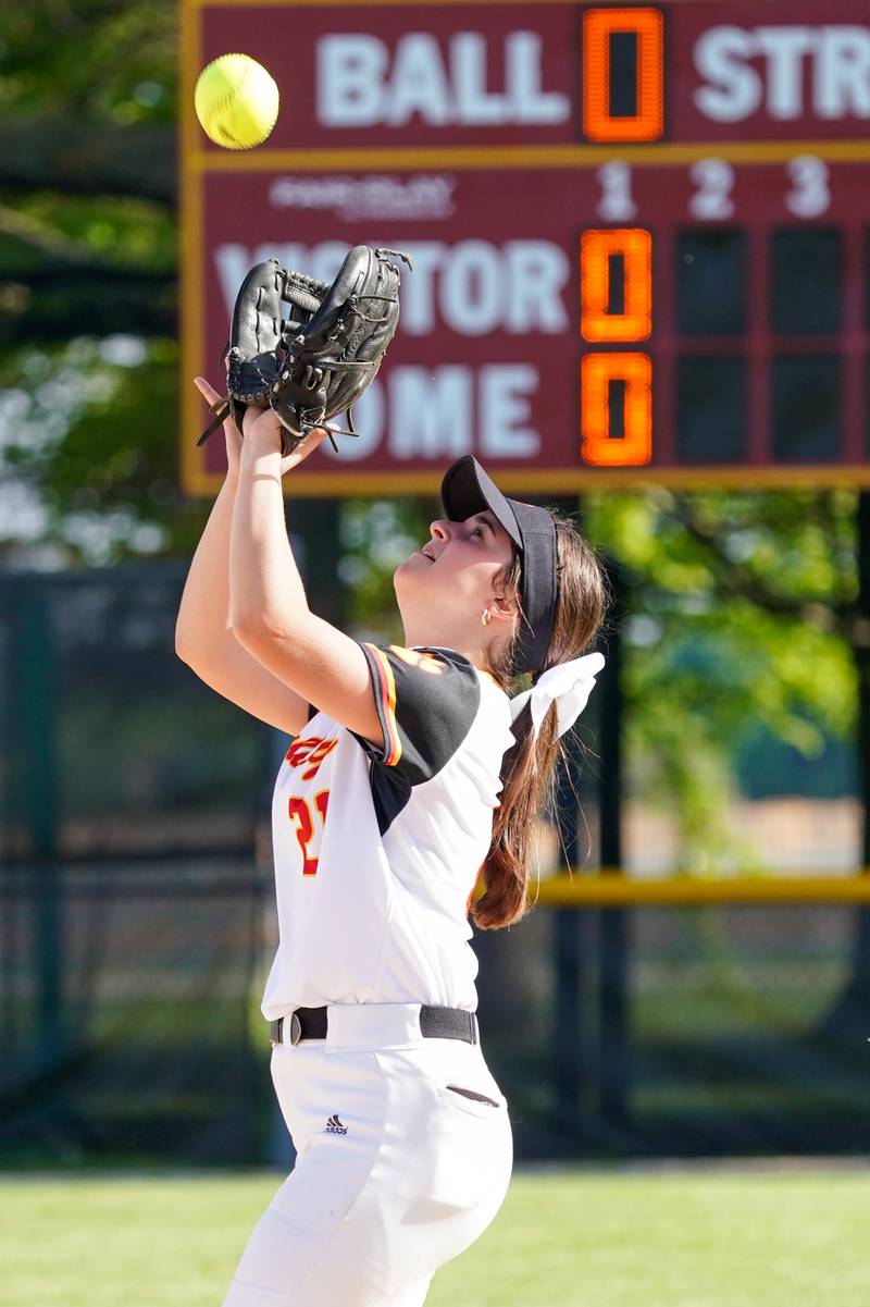 Batavia’s Bella Zagotta (21) catches a pop up for an out against Geneva during a softball game at Batavia High School on Wednesday, May 8, 2024.