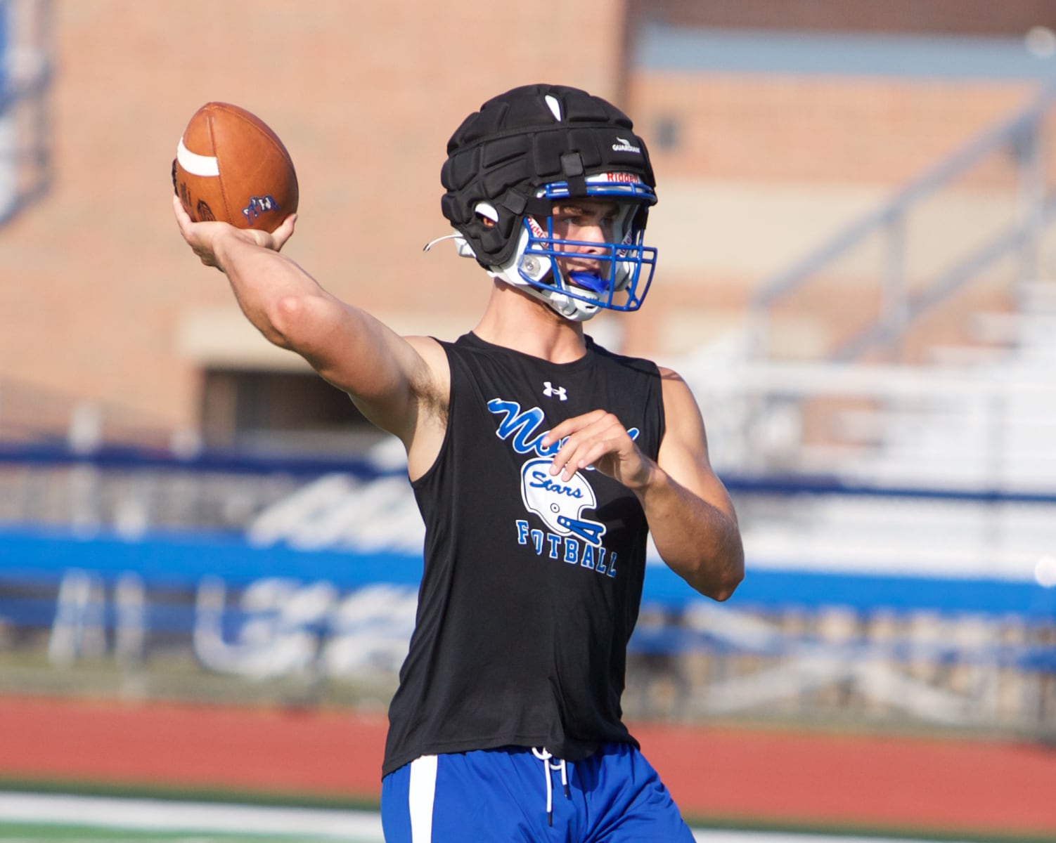 St. Charles North's Ethan Plumb practices throws during the first day of practice on Monday Aug.12,2024 in St. Charles.