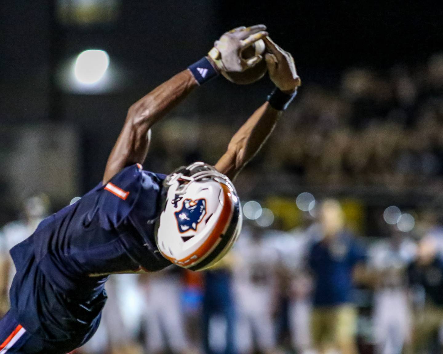 Oswego's Jeremiah Cain (1) stretches for a reception during a football game between Neuqua Valley and Oswego on Friday, Aug. 30, 2024 in Oswego. Gary E Duncan Sr for Shaw Local News Network.