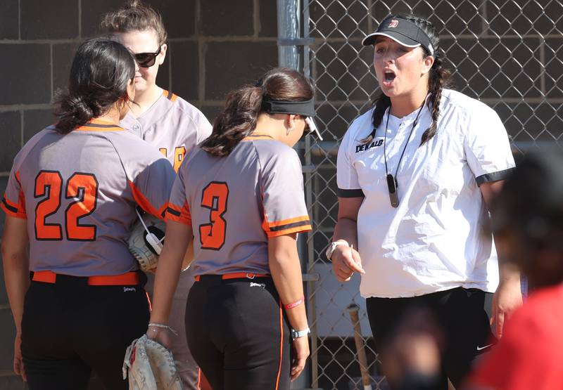 DeKalb softball head coach Haley Albamonte tries to get her team fired up during their Class 4A regional semifinal game against Rockford Auburn Wednesday, May 22, 2024, at Hampshire High School.