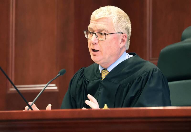 Circuit Court Judge Philip Montgomery talks to Douglas Moeller, former DeKalb School District 428 superintendent, during his sentencing Tuesday, Jan. 1, 2023, at the DeKalb County Courthouse in Sycamore. Moeller was sentenced to 24 months conditional discharge and 100 hours of community service after being found guilty of one count of non-consensual dissemination of a private sexual image, a class 4 felony.