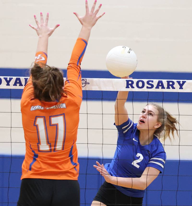 Rosary's Lily Caruso spikes the ball past Genoa-Kingston's Lily Mueller during their Regional semifinal match Tuesday, Oct. 25, 2022, at Rosary High School in Aurora.