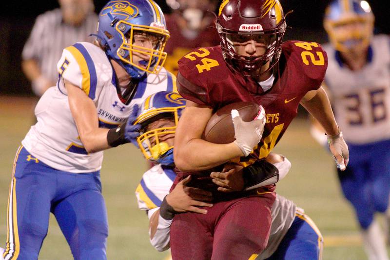 Richmond-Burton’s  Hunter Carley runs the ball against Johnsburg in varsity football action on Friday, Sept. 13, 2024, at Richmond-Burton High School in Richmond.