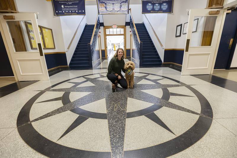 Counselor Cami Hartman and therapy dog Scone make a dynamic duo at Sterling High School.