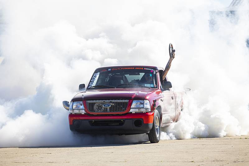 The highlight of the Monday, June 10, 2024, block party was the burn-out competition. Participants burned rubber to the cheers from the hundreds of watchers.