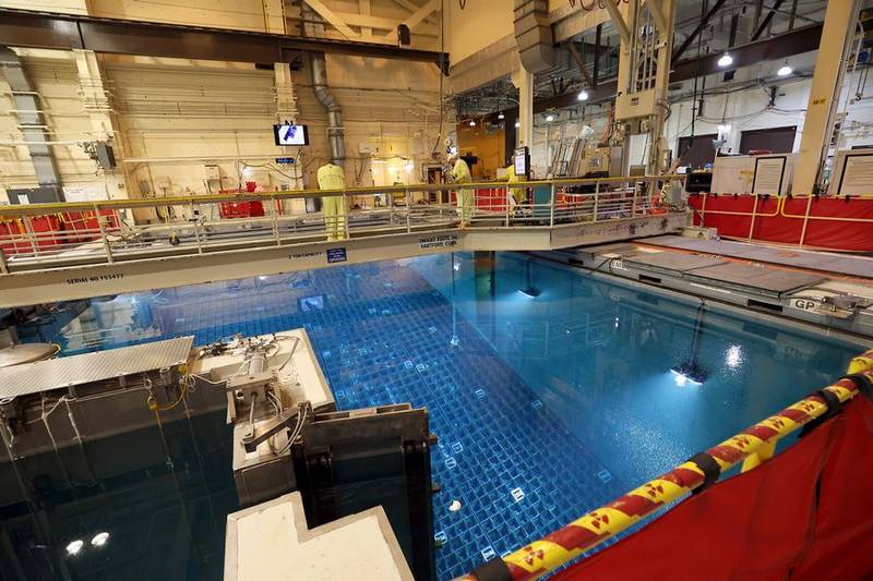 Employees remove and replace spent fuel cells in the cooling pool at the Byron Generating Station Tuesday, Oct. 17, 2023, in Byron.