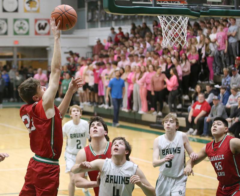 L-P's Nicholas Olivero eyes the hoop over St. Bede's Logan Potthoff on Wednesday, Feb. 14, 2024 at St. Bede Academy.
