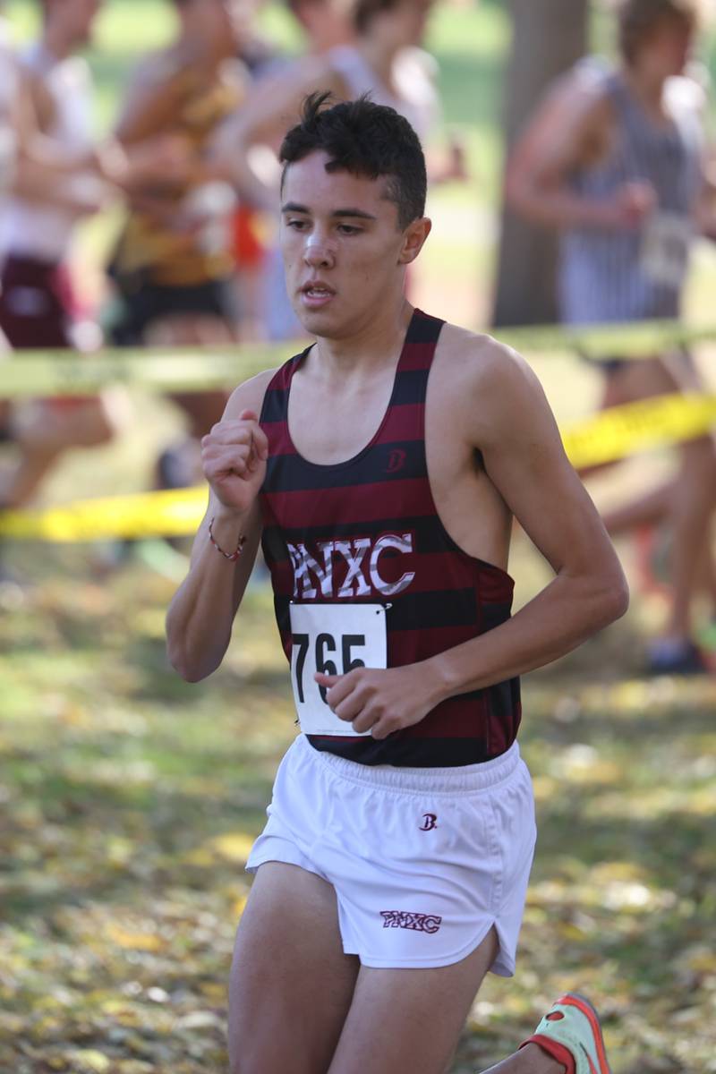 Plainfield North’s Oliver Burns leads the pack at the start in the Boys Cross Country Class 3A Minooka Regional at Channahon Community Park on Saturday.