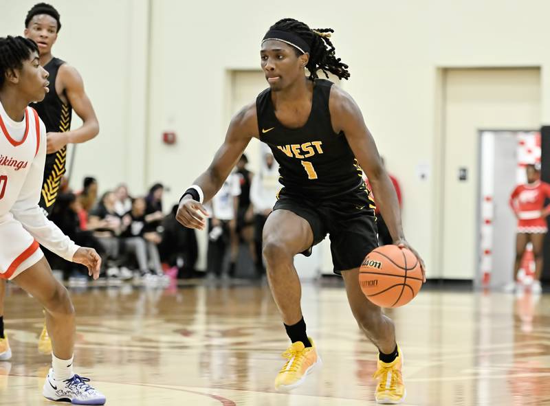 Joliet West's Justus Mcnair soars to the basket for a shot during the Class 4A sectional semifinal against Homewood Flossmoor at Rich Township on Tuesday, Feb. 27, 2024, at Richton Park. (Dean Reid for Shaw Local News Network)