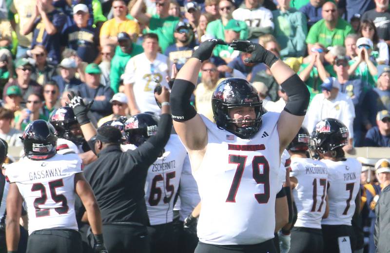 NIU's J.J. Lippe fires up the Huskies sideline before going into halftime on Saturday, Sept. 7, 2024 at Notre Dame Stadium.