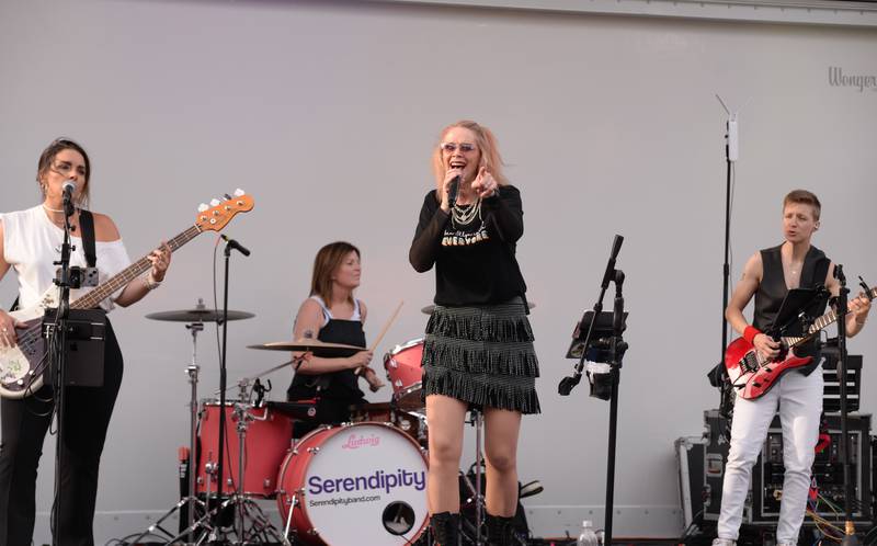 Altered Suburbia entertain families during the concert held downtown Glen Ellyn Friday June 8, 2024.