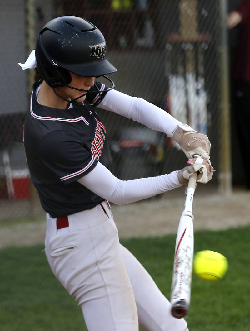 Huntley’s Ava McFadden hits the ball during a Fox Valley Conference softball game against Huntley on Monday, April 29, 2024, at Prairie Ridge High School.