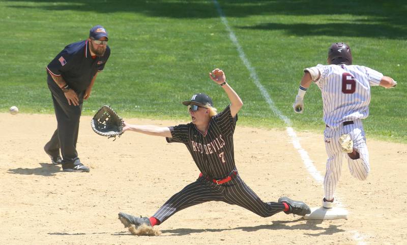 Hall first baseman Isaac Rrust stretches to catch the ball as Chillicothe's Cole Yates steps on the bag safely during the Class 2A Regional game on Saturday, May 18, 2024 at Kirby Park in Spring Valley.