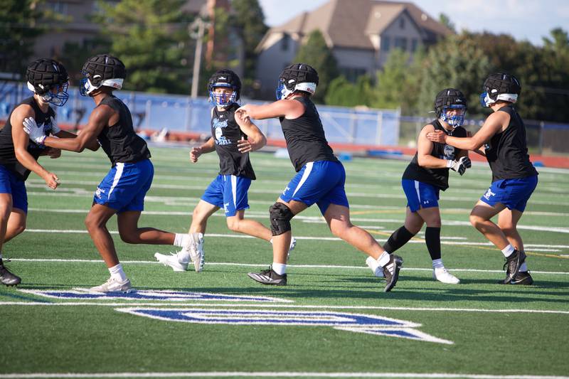 St. Charles North runs plays during the first day of practice on Monday Aug.12,2024 in St. Charles.