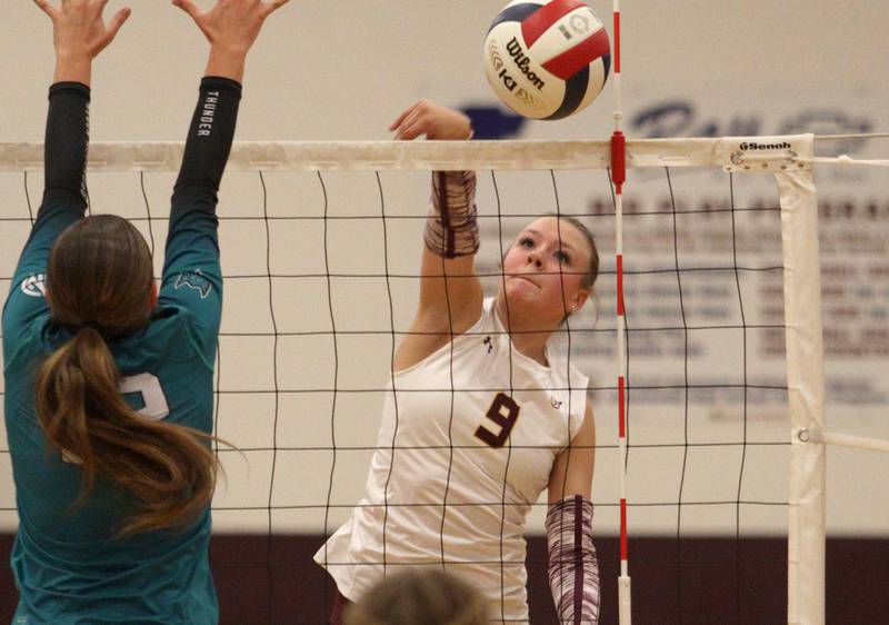 Richmond-Burton’s Reagan Wisniewski sends the ball over the net against Woodstock North in varsity volleyball on Monday, Sept. 16, 2024, at Richmond-Burton High School in Richmond.