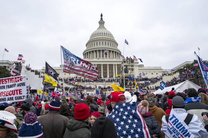 FILE - Rioters loyal to President Donald Trump rally at the U.S. Capitol in Washington on Jan. 6, 2021.  The House committee investigating the Jan. 6 attack on the U.S. Capitol is expected to interview former Secret Service agent Tony Ornato on Tuesday about Donald Trump’s actions on the day of the insurrection. (AP Photo/Jose Luis Magana, File)