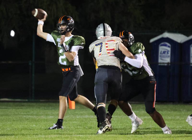 DeKalb's Cole Latimer throws a pass before the Kaneland pressure can get to him during their game Friday, Sept. 13, 2024, at Kaneland High School in Maple Park.