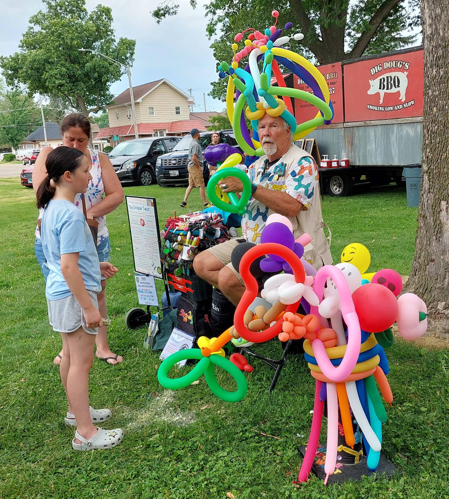 Balloon artist Doug Smith makes balloon creations Tuesday, June 4, during Streator Unlimited's Fun Day at City Park in Streator.