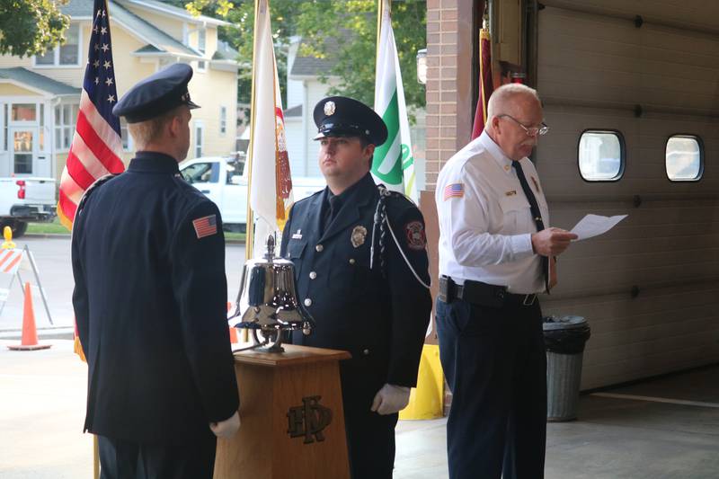 DeKalb Fire Chief Mike Thomas (right) gives brief remarks during the Patriot Day Ceremony held Sept. 11, 2024, at DeKalb Fire Station No. 1, 700 Pine St., in DeKalb.