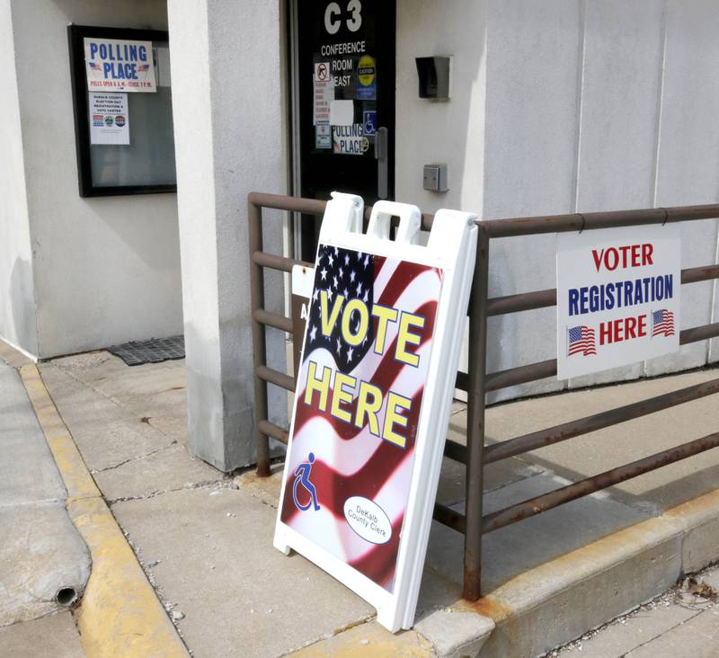 Signs welcome voters Tuesday, March 19, 2024, to the polling place at the DeKalb County Administration Building in Sycamore.