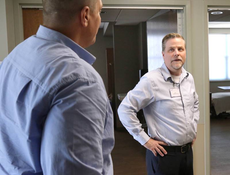 Bart Becker, (right) administrator of the DeKalb County Rehabilitation and Nursing Center, talks to DeKalb County administrator Brian Gregory Wednesday, July 10, 2024, as they lead a tour of the centers new transitional care wing. The new addition recently opened and residents have begun moving in.