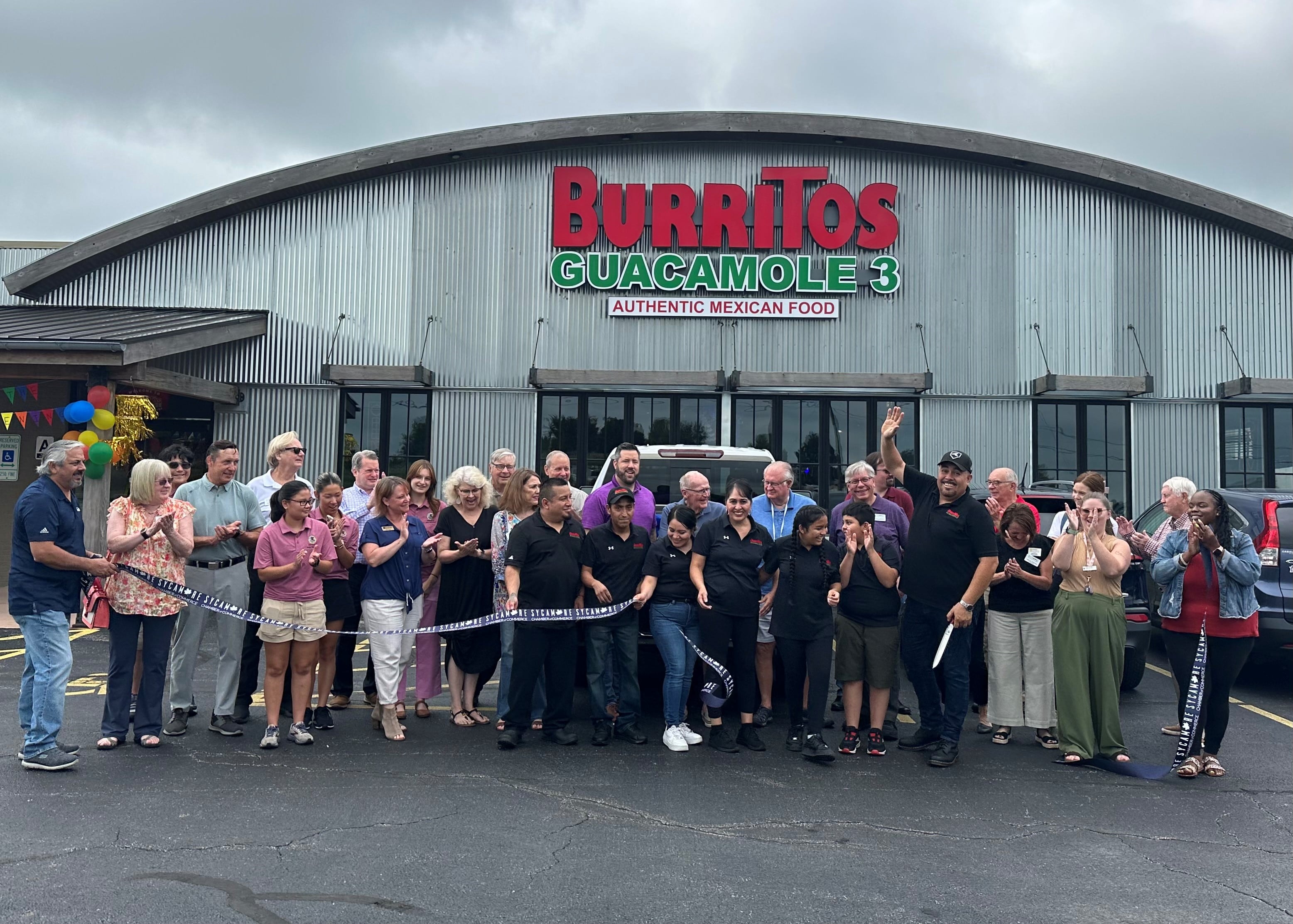 The Sycamore Chamber of Commerce welcoming Burritos Guacamole 3 with a ribbon-cutting