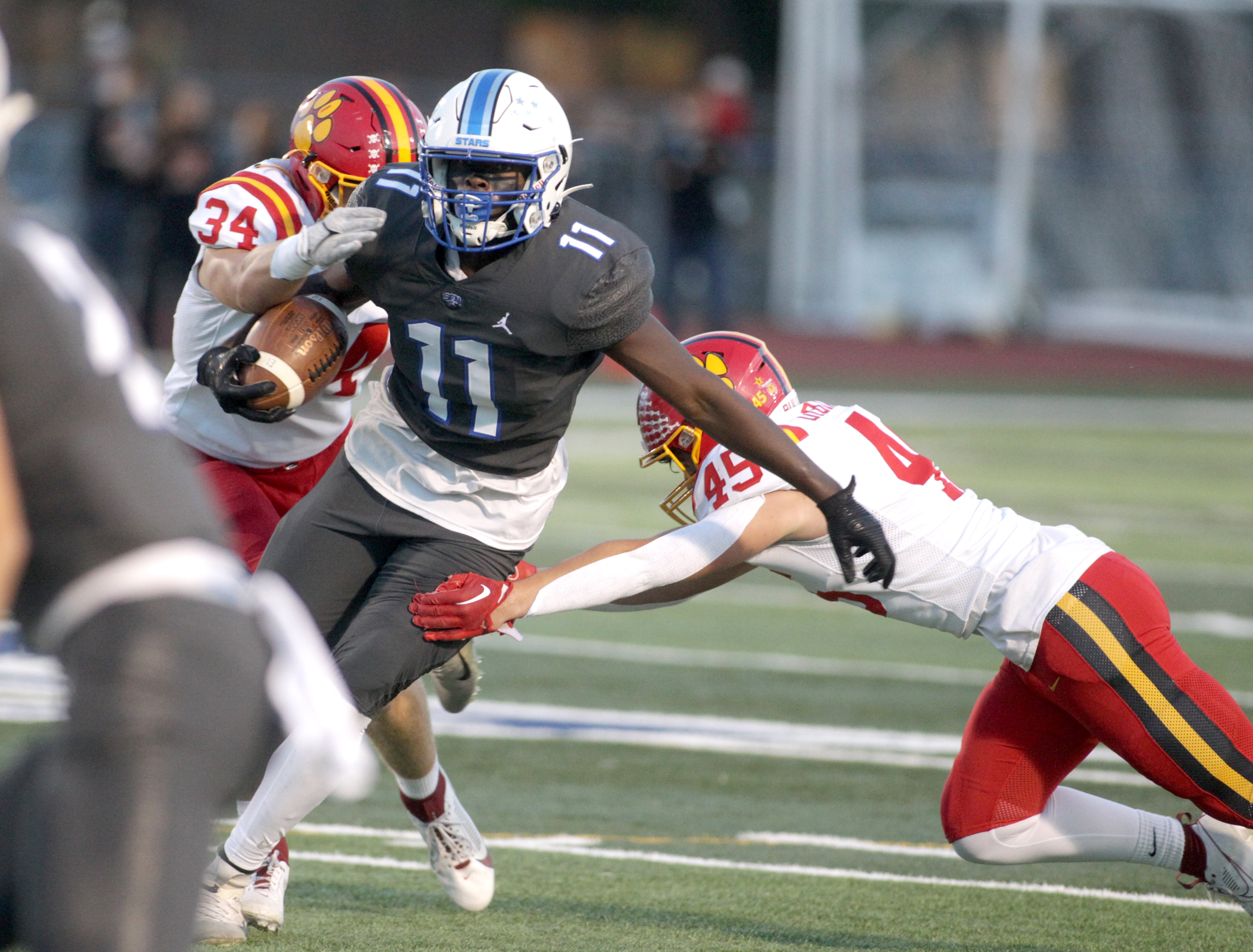 St. Charles North quarterback Ethan Plumb passes the ball during a home game against Batavia on Friday, Sept. 15, 2023.