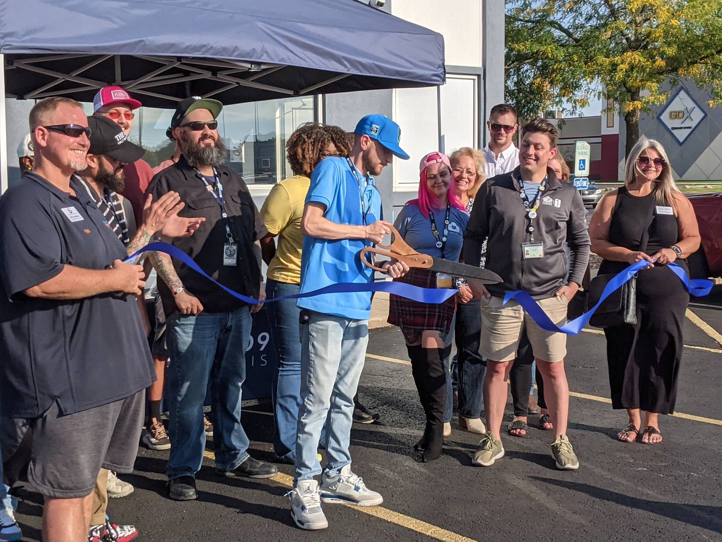 Cloud 9 Cannabis general manager cuts the ribbon during a ribbon cutting ceremony organized by the Oswego Area Chamber of Commerce. The store's grand opening weekend will continue on Sept. 14.

There will be all day activities from 10 a.m. to 6 p.m. along with a 30% store-wide discount.