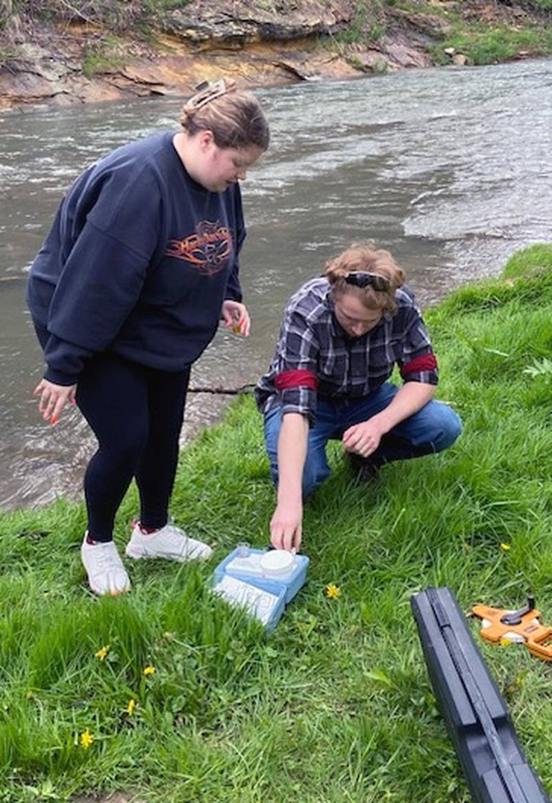 Illinois Valley Community College students and several science faculty headed to a river in north La Salle for the 46th annual river testing exercise. Back in the laboratory, students through microscopes observed the hatching of a caddisfly armed with ferocious-looking claws. Such creatures are important barometers of the river’s health.